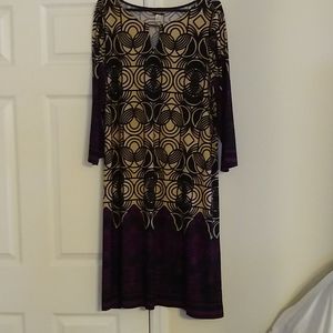 Cute dress in tan black and purple